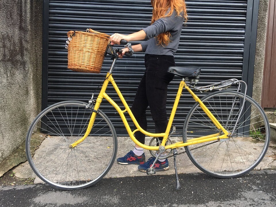 ladies yellow bike with basket